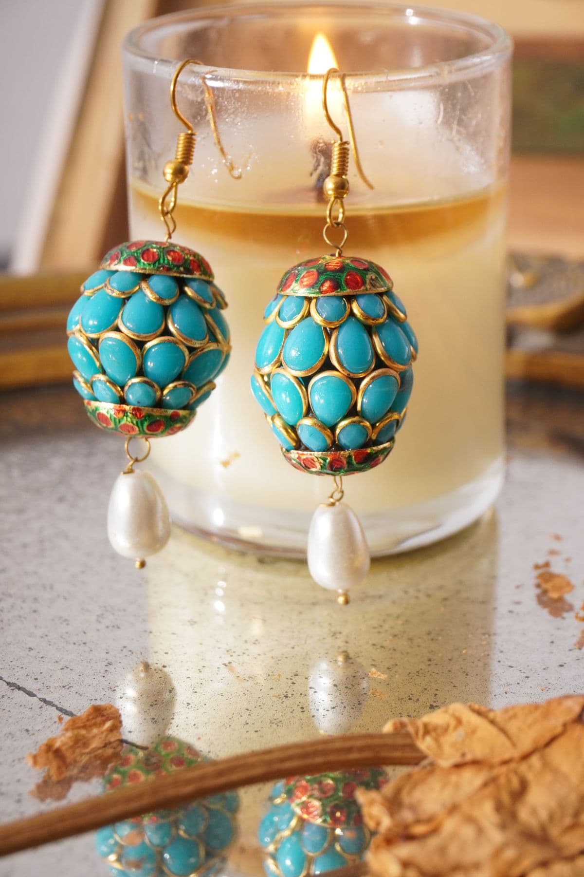 Turquoise drop earrings by candlelight